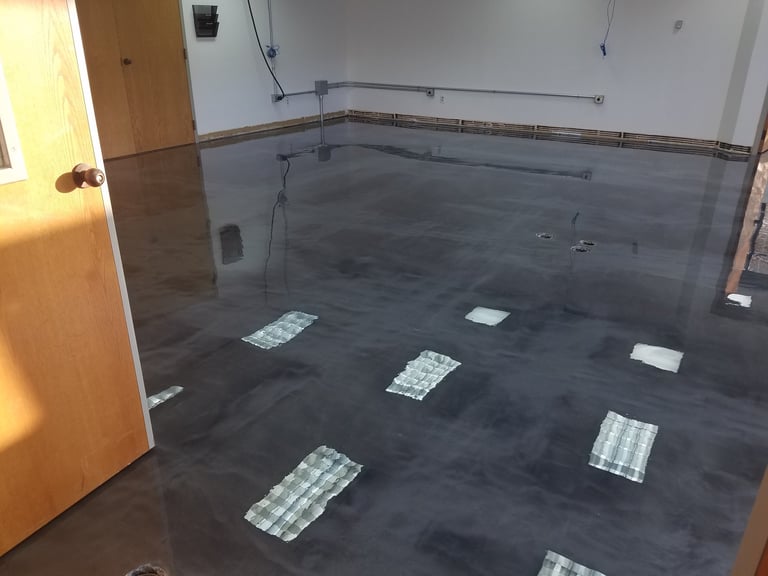 Beautiful metallic epoxy garage floor with reflective finish